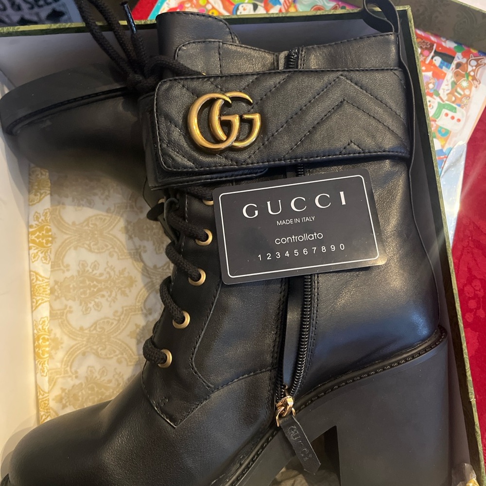 Gucci Women's Black Heeled Boots with Gold Accents